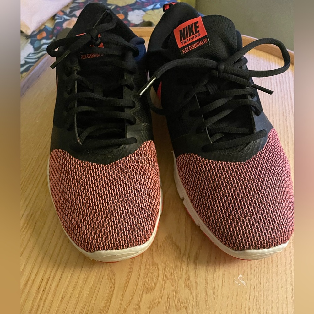 Likely worn Nike sneakers women size 9.